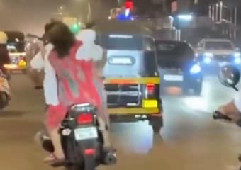 Couple Fight on Bike Shocks Public: Girl Hits Man From Behind on Busy Road img_0140.jpg