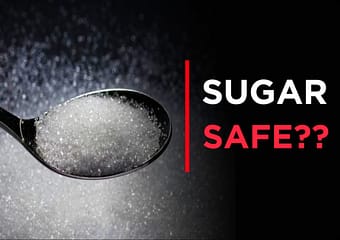 Is Sugar Unhealthy? Health Risks and Safe Limits Sugar Unhealthy concept showing sugar cubes, sweets, and processed foods on a table