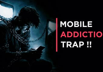 Phone Addiction: Hidden Effects on Health and Daily Life Man sitting in dark room using smartphone at night showing signs of Phone Addiction