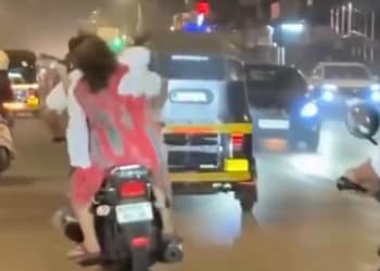 Couple Fight on Bike Shocks Public: Girl Hits Man From Behind on Busy Road img_0140.jpg