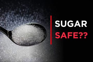 Is Sugar Unhealthy? Health Risks and Safe Limits Sugar Unhealthy concept showing sugar cubes, sweets, and processed foods on a table