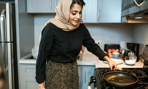 Induction vs Gas Stove setup in a modern apartment kitchen