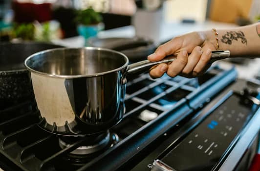 Induction vs Gas Stove traditional cooking on gas stove